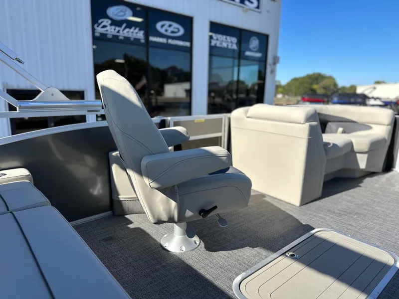 Slide: The Image of 2024 Barletta A20UC boat interior with plush seating and modern design. - 15