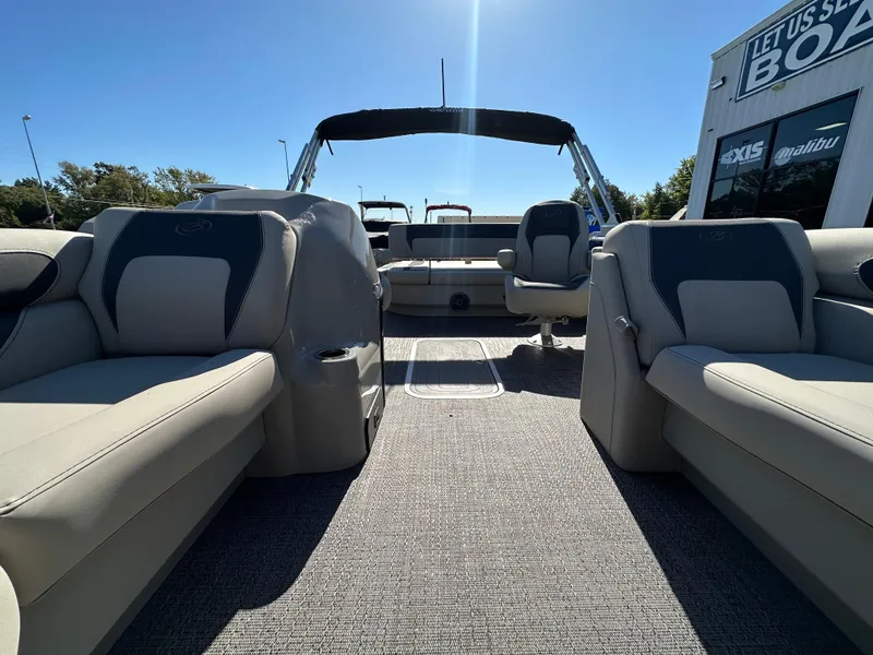 Slide: The Image of 2024 Barletta A20UC boat interior with plush seating and modern design. - 19