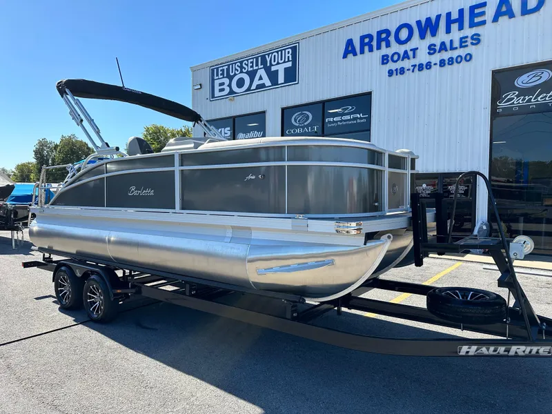 Slide: The Image of 2024 Barletta A20UC pontoon boat on trailer at Arrowhead Boat Sales. - 2