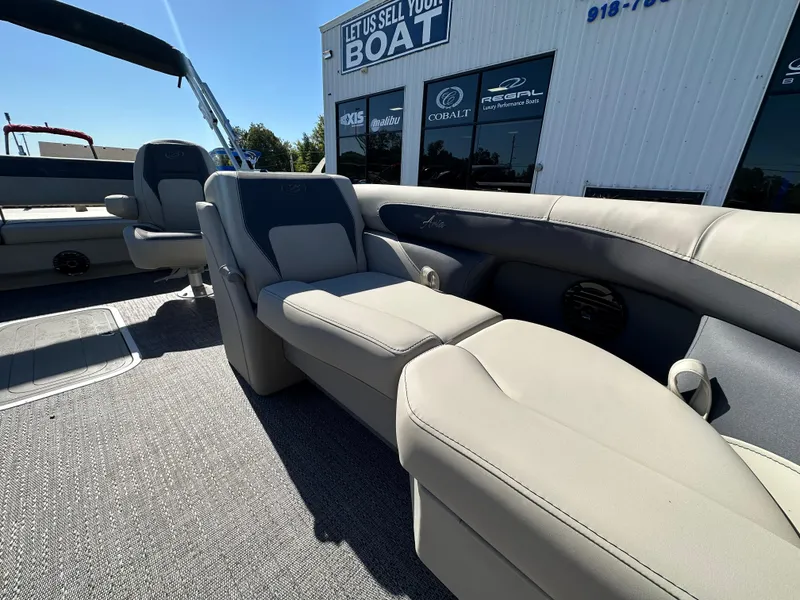 Slide: The Image of 2024 Barletta A20UC boat interior with plush seating and modern design. - 21