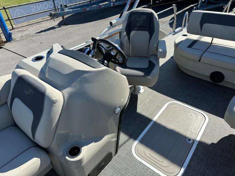 Slide: The Image of 2024 Barletta A20UC boat interior with steering console and seating. - 22
