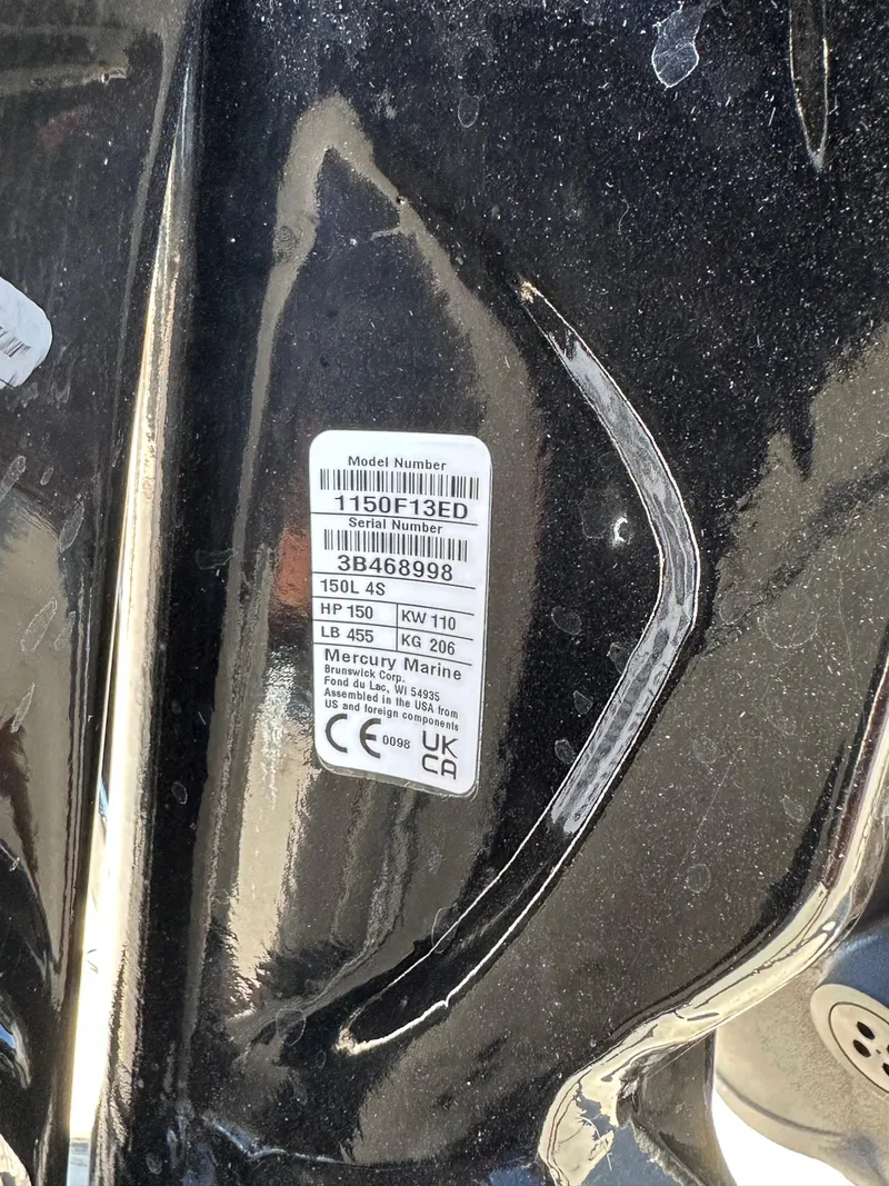 Slide: The Image of 2024 Barletta A20UC Mercury Marine engine label with specifications and serial number. - 27