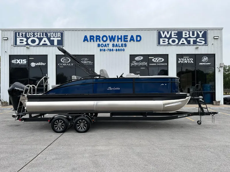 Slide: The Image of 2025 Barletta A22UC pontoon boat at Arrowhead Boat Sales dealership. - 1