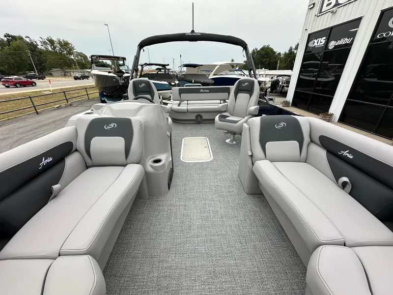Slide: The Image of 2025 Barletta A22UC pontoon boat interior with gray seating and modern design. - 21