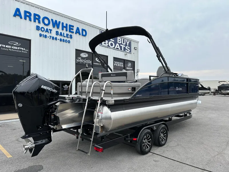 Slide: The Image of 2025 Barletta A22UC pontoon boat at Arrowhead Boat Sales dealership. - 8