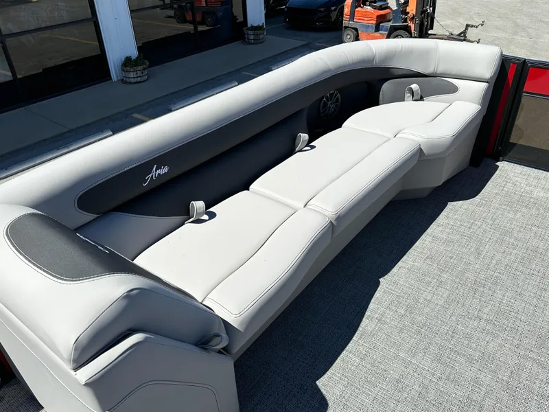 Slide: The Image of 2025 Barletta A24UC boat interior with luxurious white seating and modern design. - 20