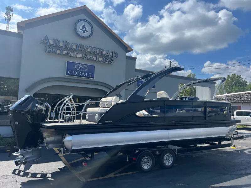 Slide: The Image of 2025 Barletta L25UEA pontoon boat at Arrowhead Boat Sales dealership. - 1