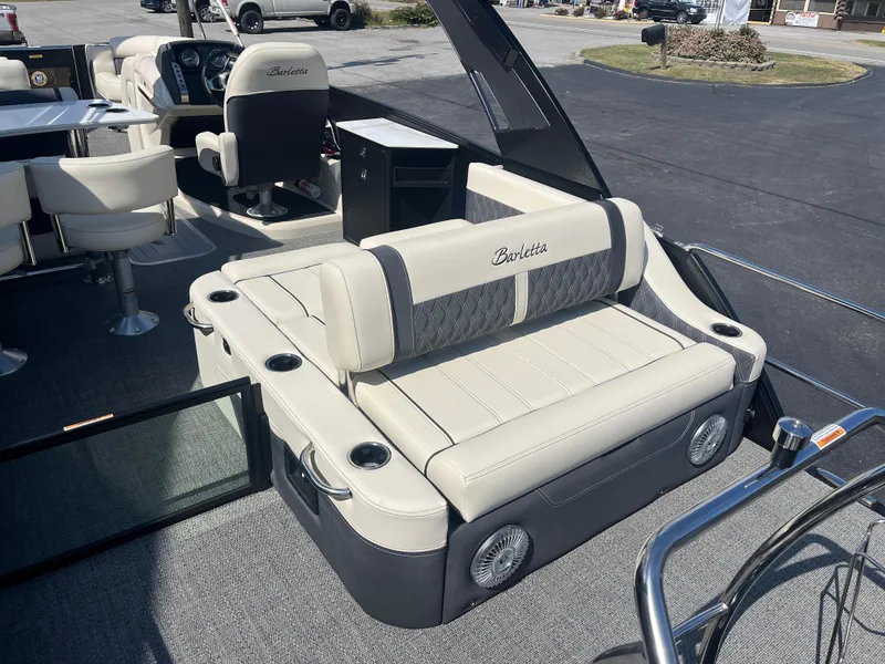 Slide: The Image of 2025 Barletta L25UEA boat interior with luxurious seating and modern design. - 11