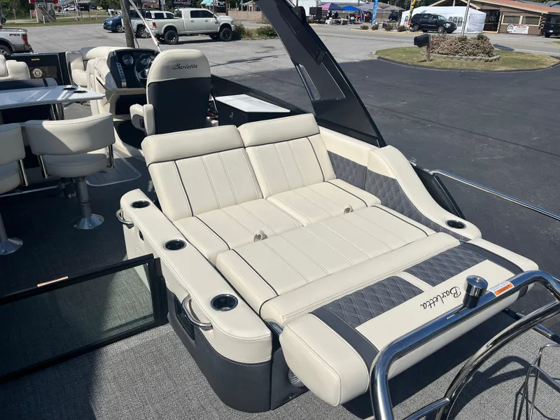 Slide: The Image of 2025 Barletta L25UEA boat interior with luxurious seating and modern design. - 15