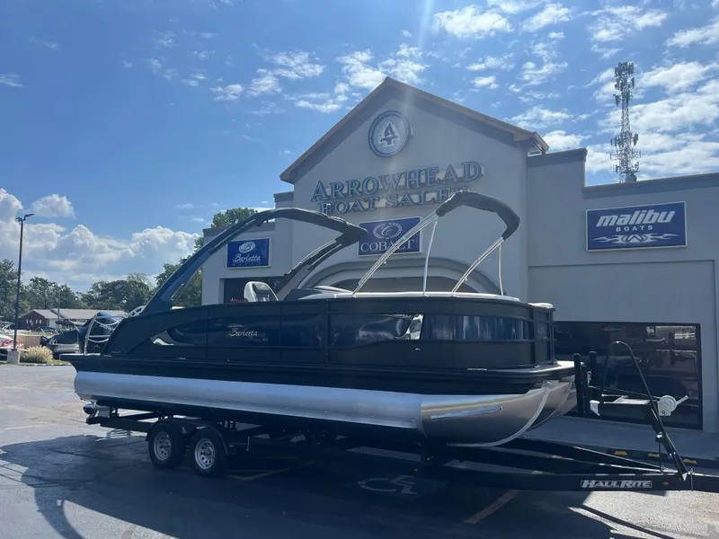 Slide: The Image of 2025 Barletta L25UEA pontoon boat at Arrowhead Boat Sales dealership. - 2