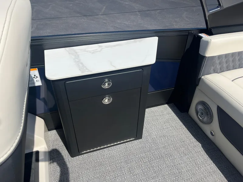 Slide: The Image of 2025 Barletta L25UEA interior with sleek cabinetry and luxurious seating. - 20