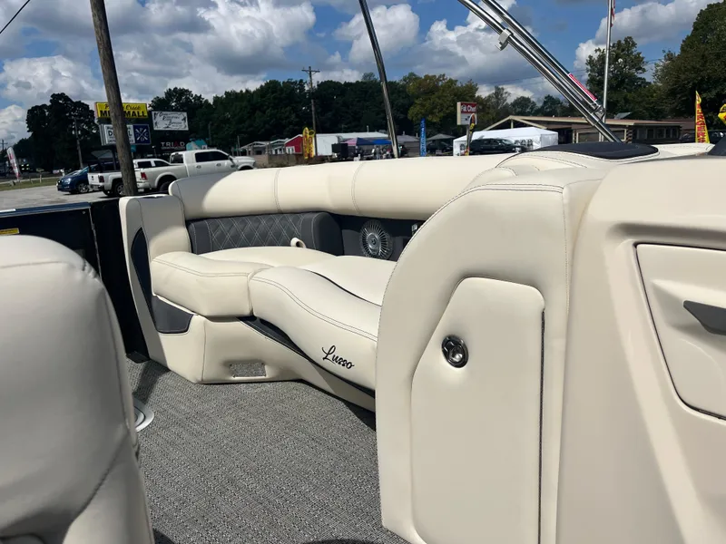 Slide: The Image of Luxurious interior of 2025 Barletta L25UEA pontoon boat with plush seating. - 34