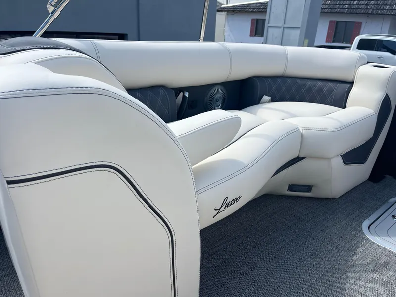 Slide: The Image of Luxurious seating in 2025 Barletta L25UEA boat, featuring elegant white upholstery and modern design. - 37