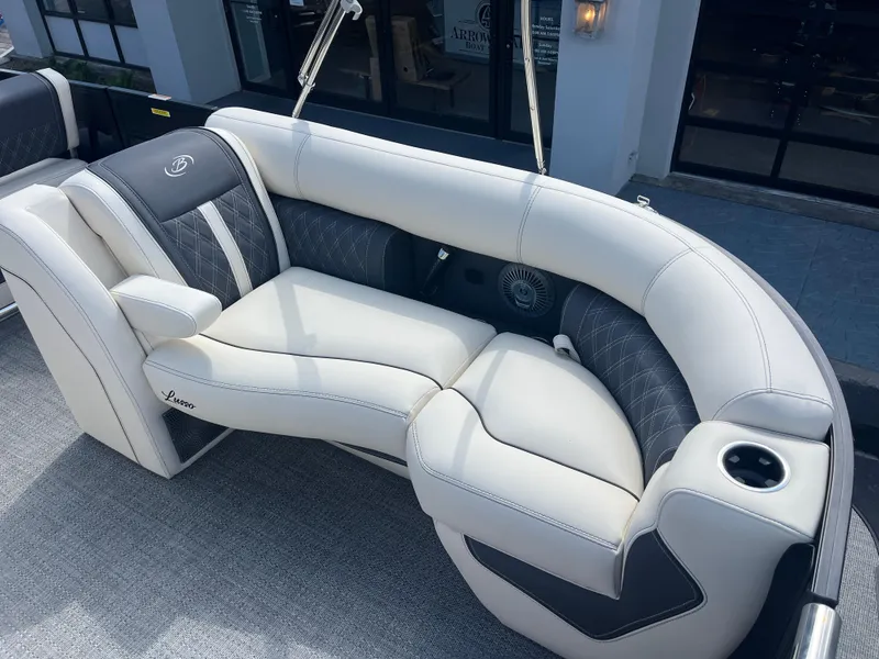 Slide: The Image of Luxurious seating on 2025 Barletta L25UEA boat with elegant design and cup holder. - 38