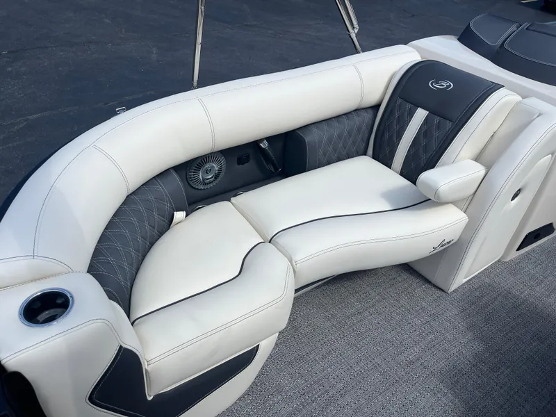Slide: The Image of Luxurious seating on 2025 Barletta L25UEA boat with elegant white and gray upholstery. - 39