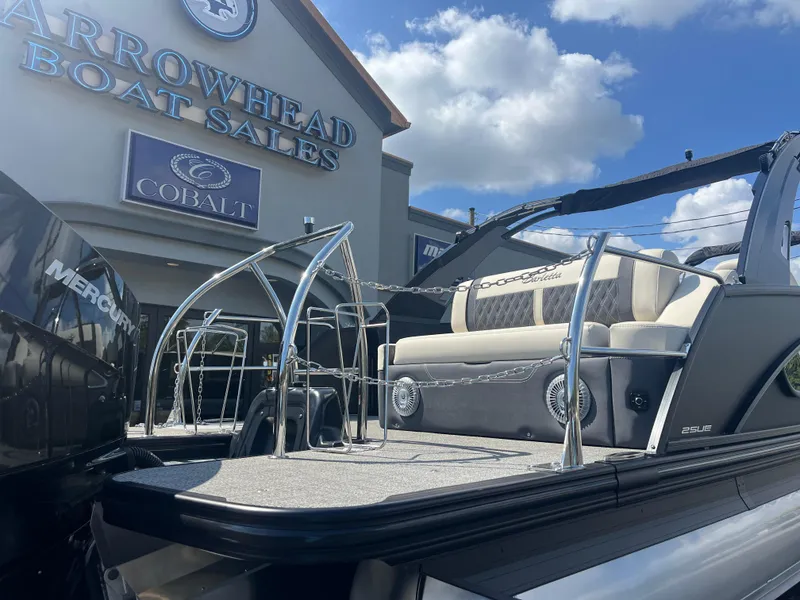 Slide: The Image of 2025 Barletta L25UEA pontoon boat at Arrowhead Boat Sales dealership. - 7