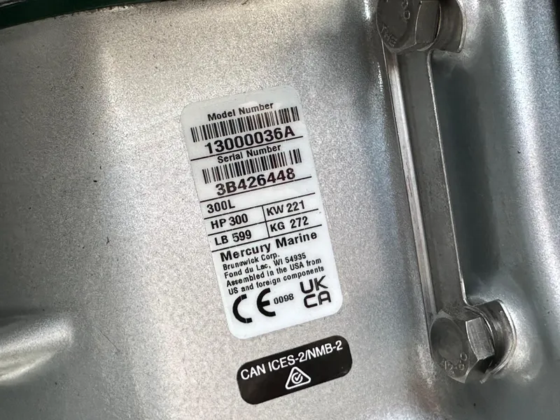Slide: The Image of Close-up of Mercury Marine engine label on 2024 Barletta X23UC boat. - 24