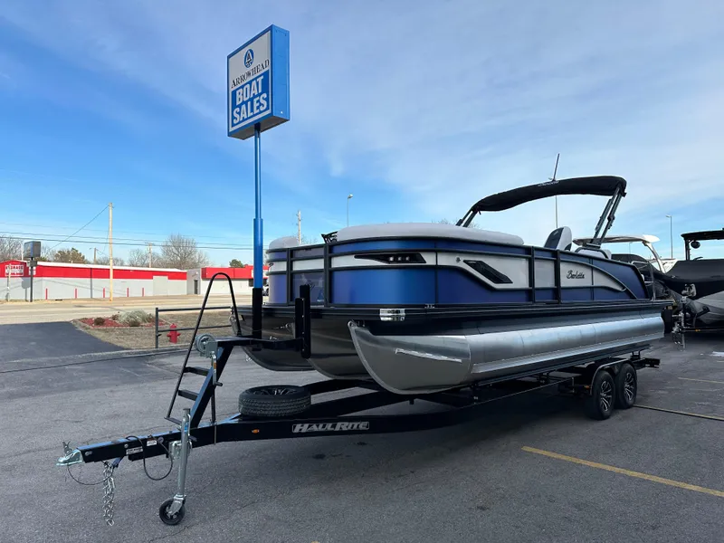 Slide: The Image of 2024 Barletta X23UC pontoon boat on trailer at Arrowhead Boat Sales. - 7
