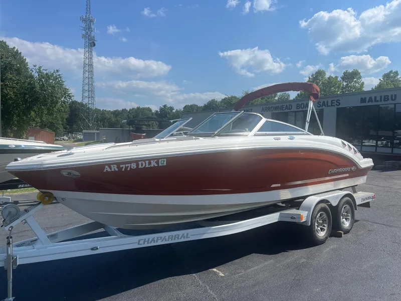 Slide: The Image of 2010 Chaparral 226 boat on trailer at dealership, sunny day. - 5