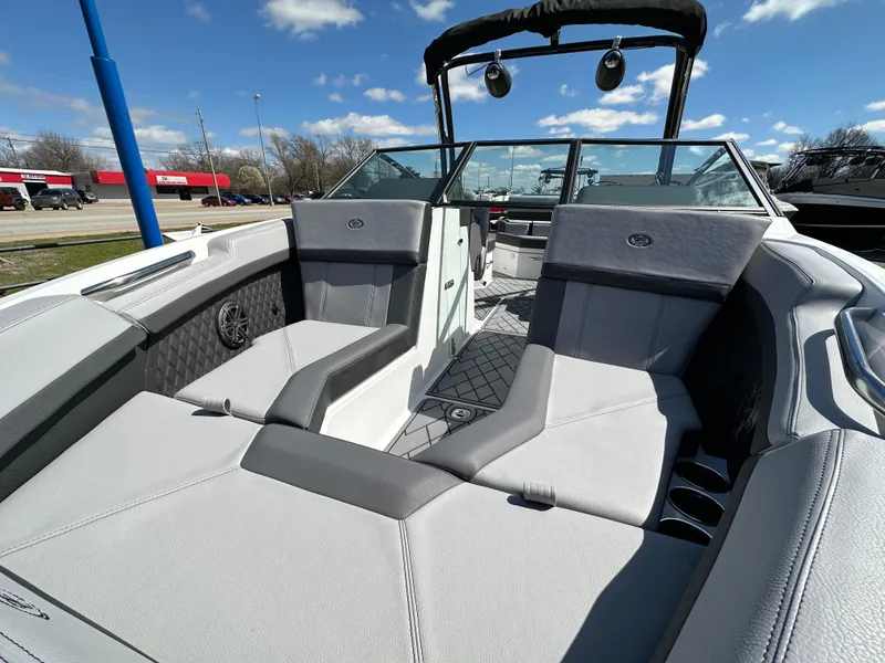 Slide: The Image of 2023 Cobalt R4 boat interior with plush seating and modern design. - 10