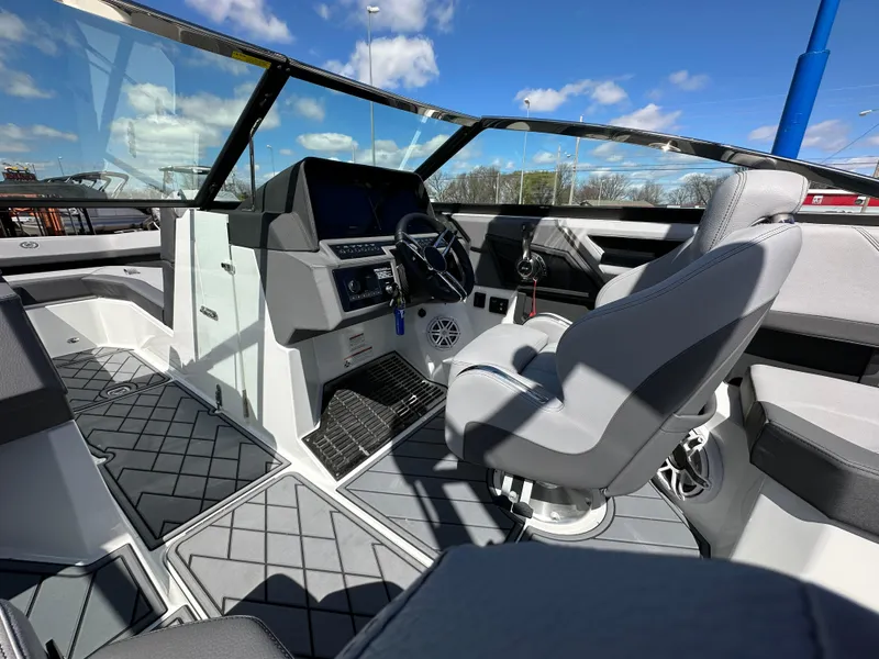 Slide: The Image of Interior of 2023 Cobalt R4 boat with modern dashboard and seating. - 16