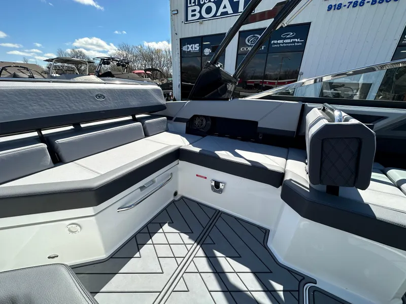 Slide: The Image of 2023 Cobalt R4 boat interior with sleek seating and modern design. - 18