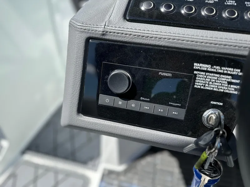 Slide: The Image of Cobalt R4 2023 dashboard with Fusion audio system and ignition keys. - 25