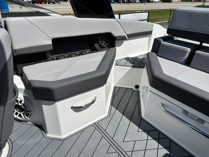 Slide: The Image of 2023 Cobalt R4 boat interior with gray seating and modern design. - 28