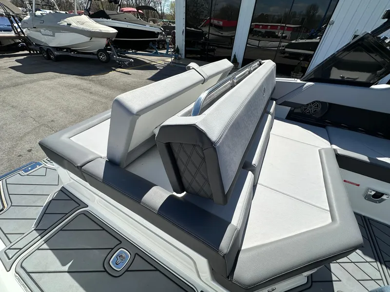 Slide: The Image of 2023 Cobalt R4 boat interior with gray seating and sleek design. - 31