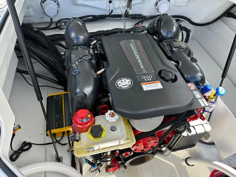 Slide: The Image of 2023 Cobalt R4 engine compartment featuring a Volvo Penta 350 V8 engine. - 32