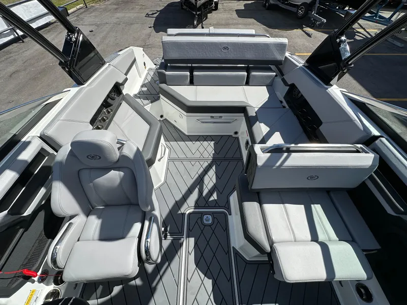 Slide: The Image of 2023 Cobalt R4 boat interior with luxurious seating and modern design. - 34