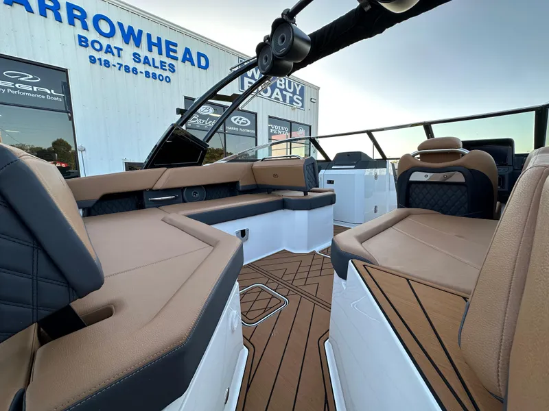 Slide: The Image of 2024 Cobalt R6 boat interior with tan seating at Arrowhead Boat Sales. - 10