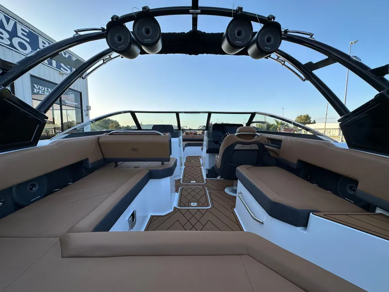 Slide: The Image of Luxurious interior of 2024 Cobalt R6 boat with brown seating and modern design. - 11