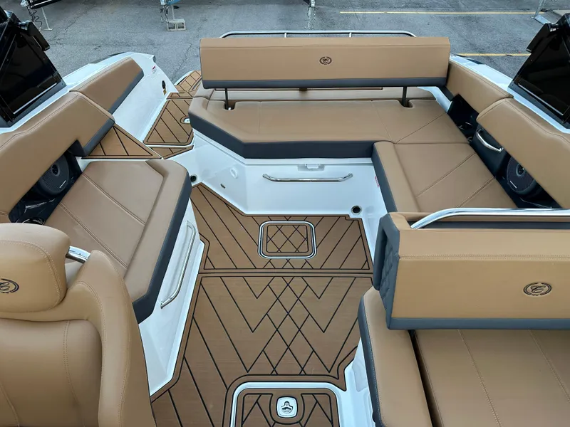 Slide: The Image of 2024 Cobalt R6 boat interior with tan seating and stylish flooring. - 27