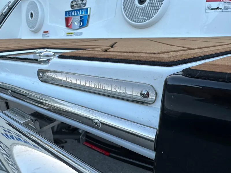 Slide: The Image of 2024 Cobalt R6 boat with registration number, featuring sleek design and premium materials. - 31