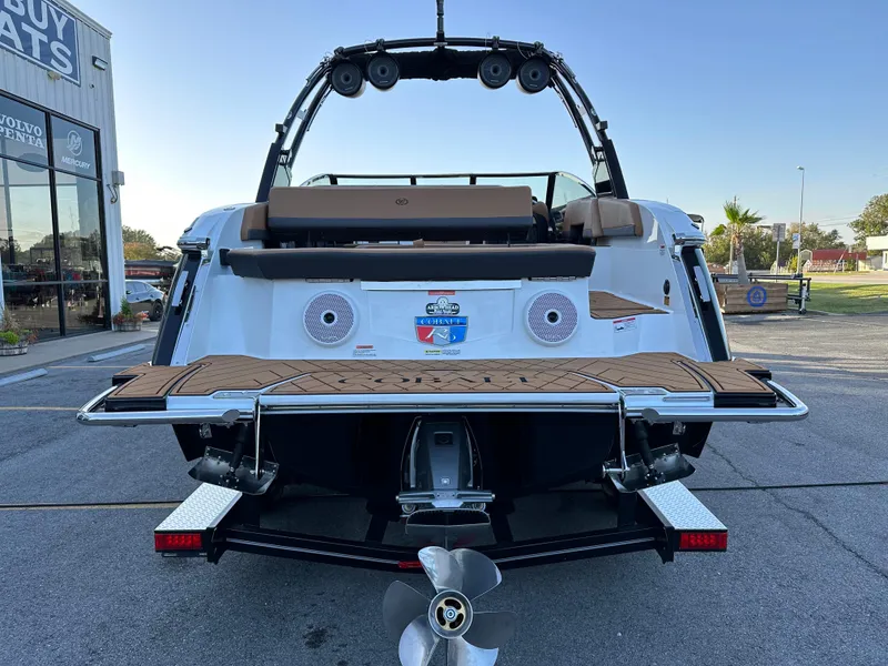 Slide: The Image of 2024 Cobalt R6 boat rear view with swim platform and speakers. - 4