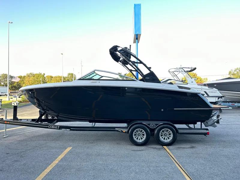 Slide: The Image of 2024 Cobalt R6 boat on trailer in outdoor showroom. - 6