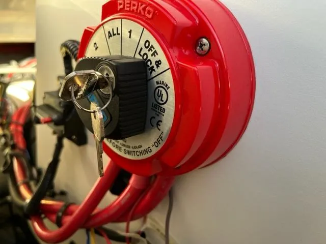 Slide: The Image of Red Perko marine battery switch with key, Cownline 225ss 2018 model. - 13