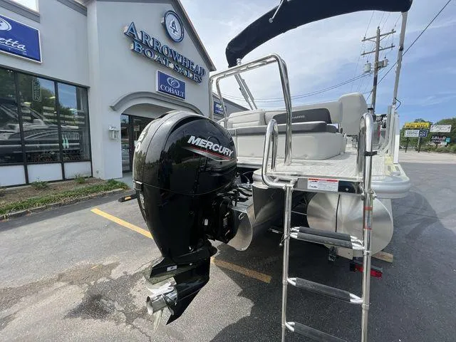 Slide: The Image of 2024 Harris 230CX pontoon boat with Mercury outboard motor at Arrowhead Boat Sales. - 23