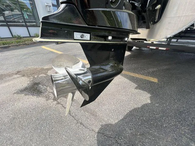 Slide: The Image of Close-up of 2024 Harris 230CX boat propeller on pavement. - 25