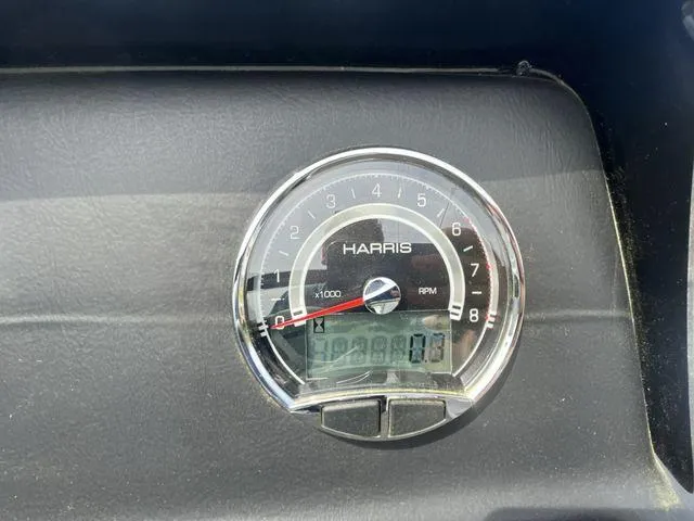 Slide: The Image of 2024 Harris 230CX RPM gauge displaying 1298.0 hours. - 8