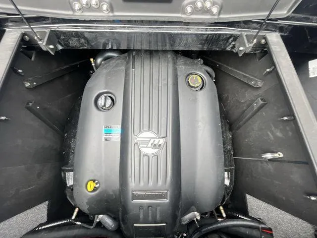 Slide: The Image of 2024 Malibu 23LSV engine compartment, showcasing powerful inboard motor design. - 13
