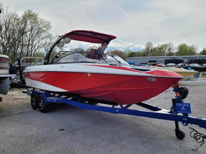 Slide: The Image of Red 2007 Malibu 247 Wakesetter boat on trailer, for sale at dealership. - 15