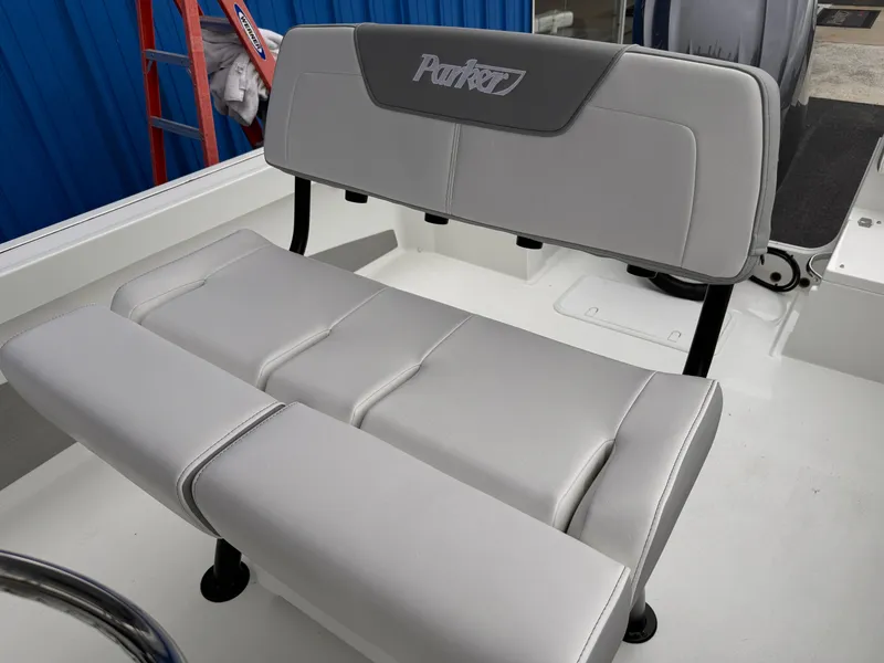 Slide: The Image of 2025 Parker 23SE Center Console boat seat with gray upholstery. - 22