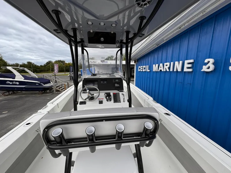 Slide: The Image of 2025 Parker 23SE Center Console boat at Cecil Marine dealership. - 24