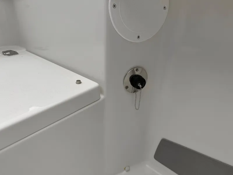 Slide: The Image of 2025 Parker 23SE Center Console boat interior detail with ignition key. - 29