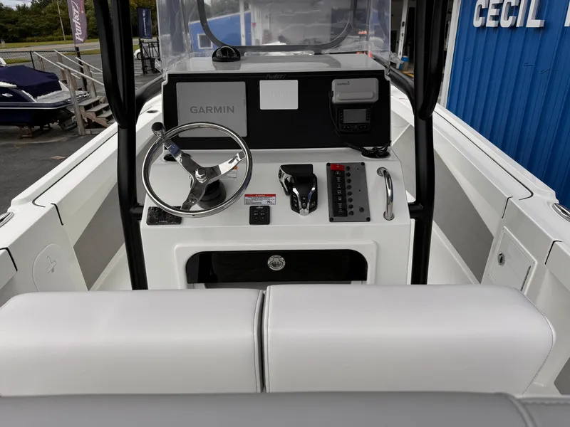 Slide: The Image of 2025 Parker 23SE Center Console boat interior with Garmin navigation system. - 7