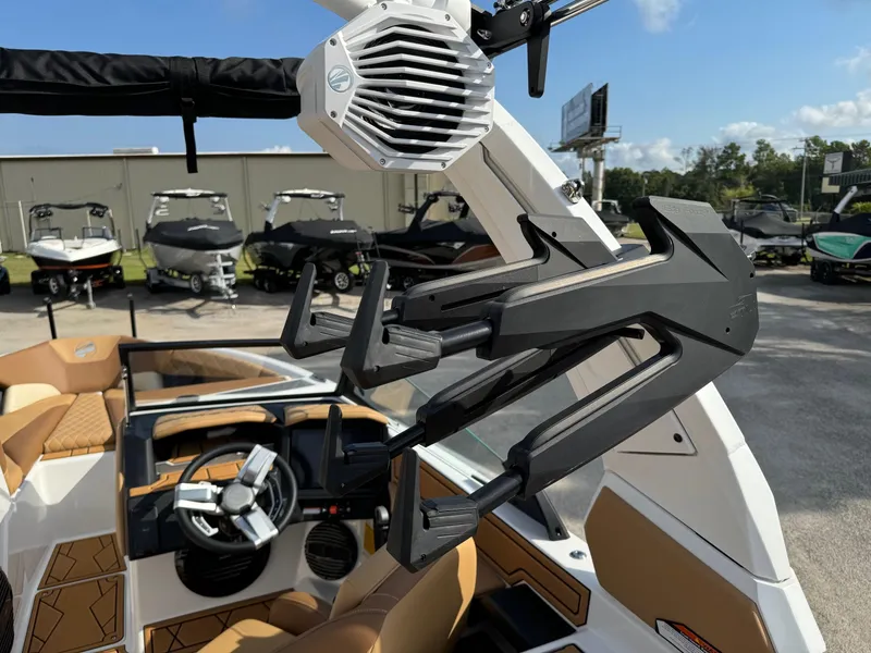 Slide: The Image of 2025 Tigé Z5 boat interior with advanced speaker system and sleek design. - 4