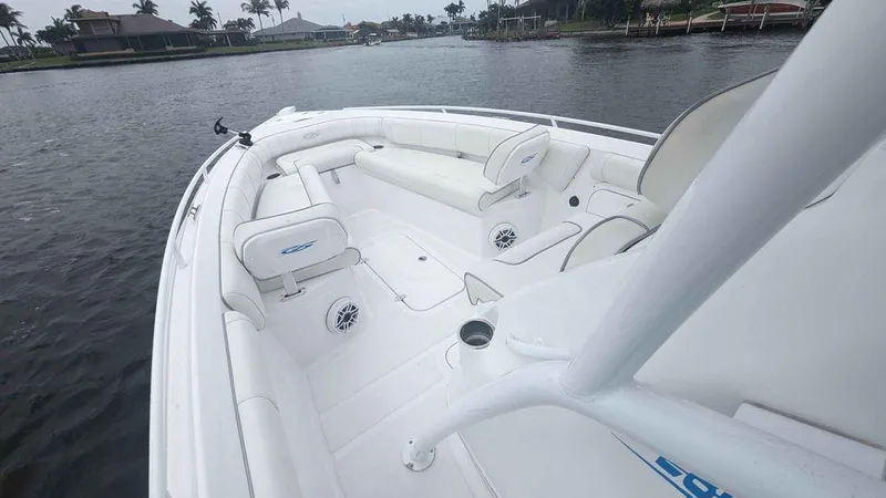 Slide: The Image of 2022 Glasstream 280 Pro-XS boat interior with white seating on calm water. - 5