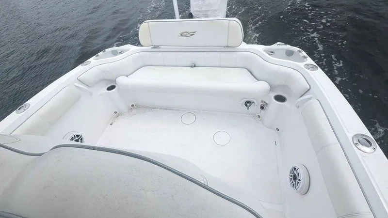 Slide: The Image of 2022 Glasstream 280 Pro-XS boat interior with white seating and ocean backdrop. - 6